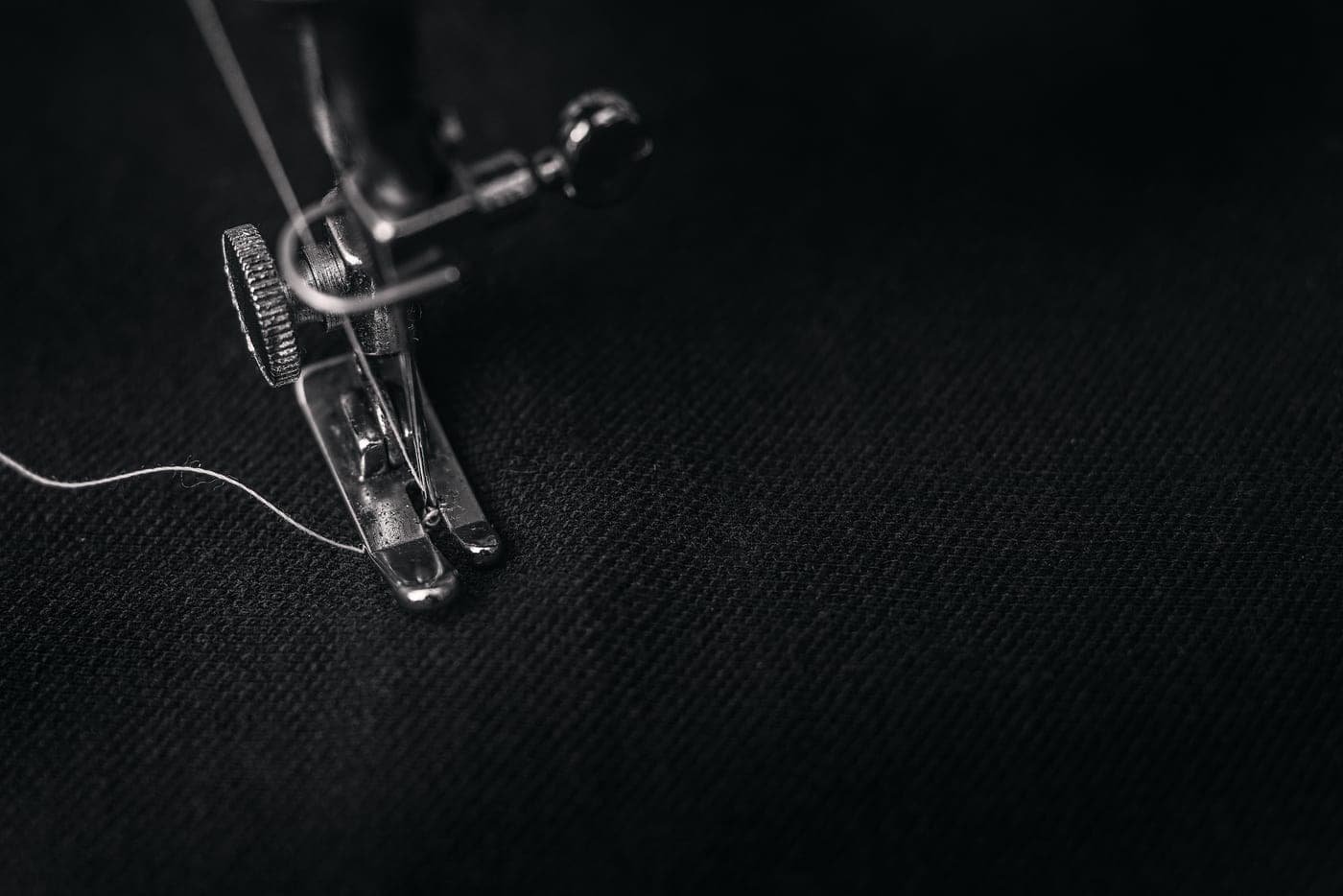 Close view of the presser foot of a sewing machine