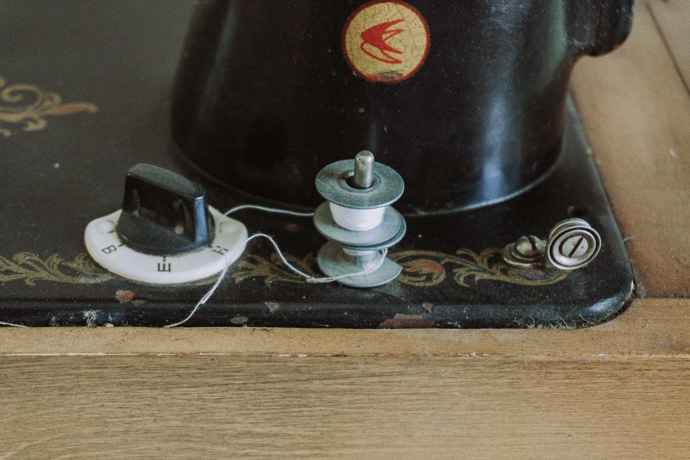 Close view of the mechanical details of a sewing machine