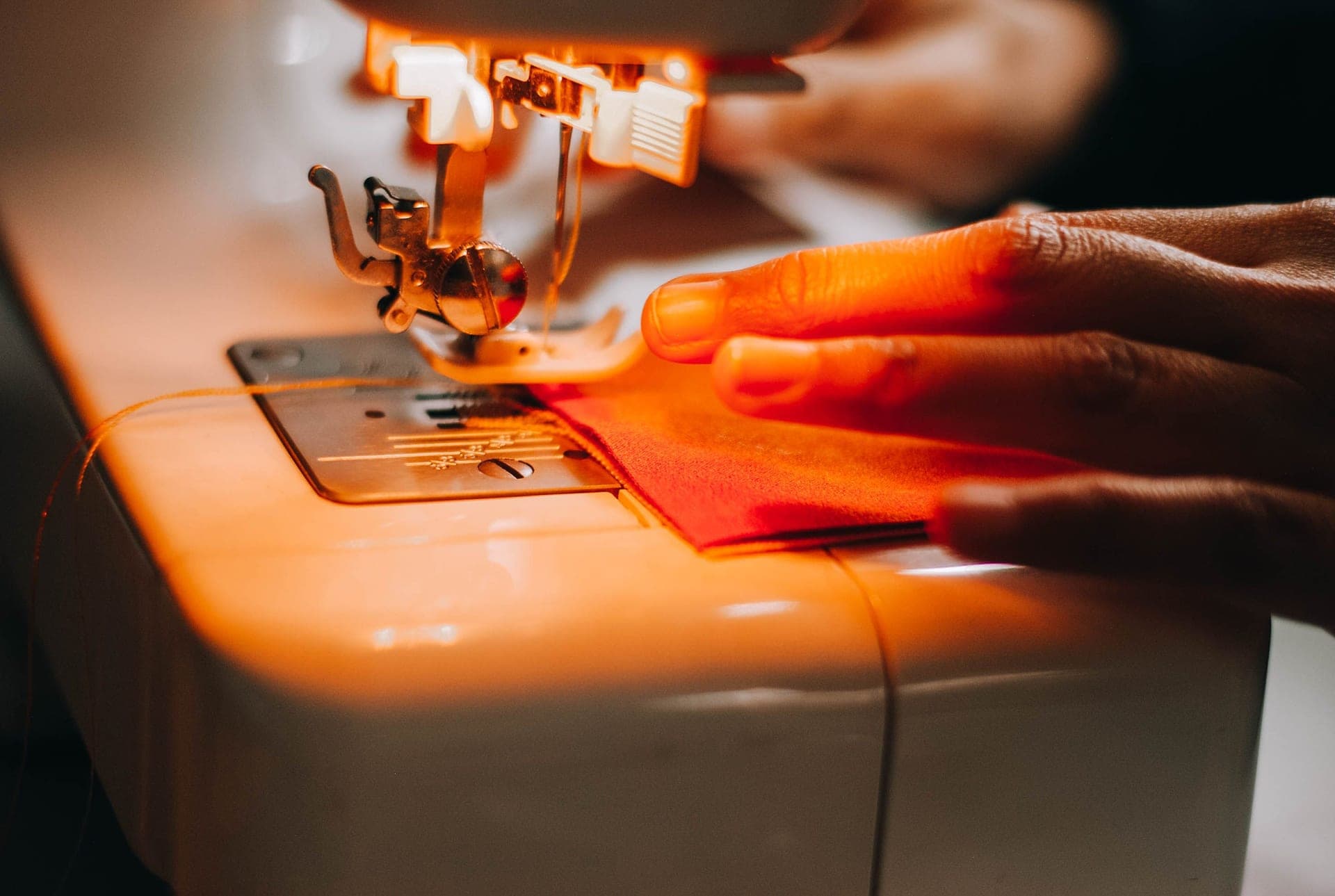 Close view of a sewing machine in use on fabric